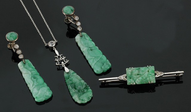 Appraisal: A collection of jade jewellery Comprising a carved jade pendant