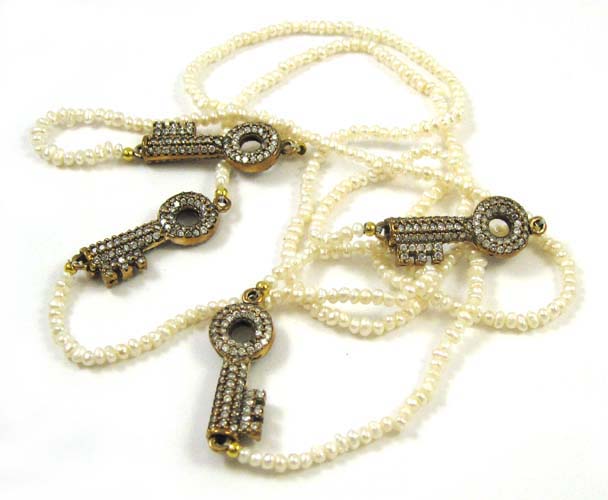 Appraisal: ROPE LENGTH SEED PEARL NECKLACE inches in length with white