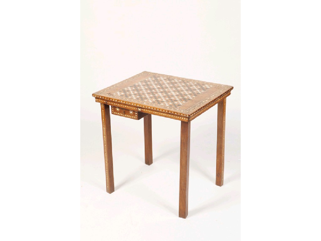 Appraisal: AN EGYPTIAN STYLE GAMES TABLE the rectangular top set with