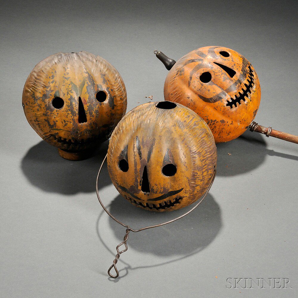 Appraisal: Three Painted Tin Jack-o'-Lantern Parade Lanterns America late th early