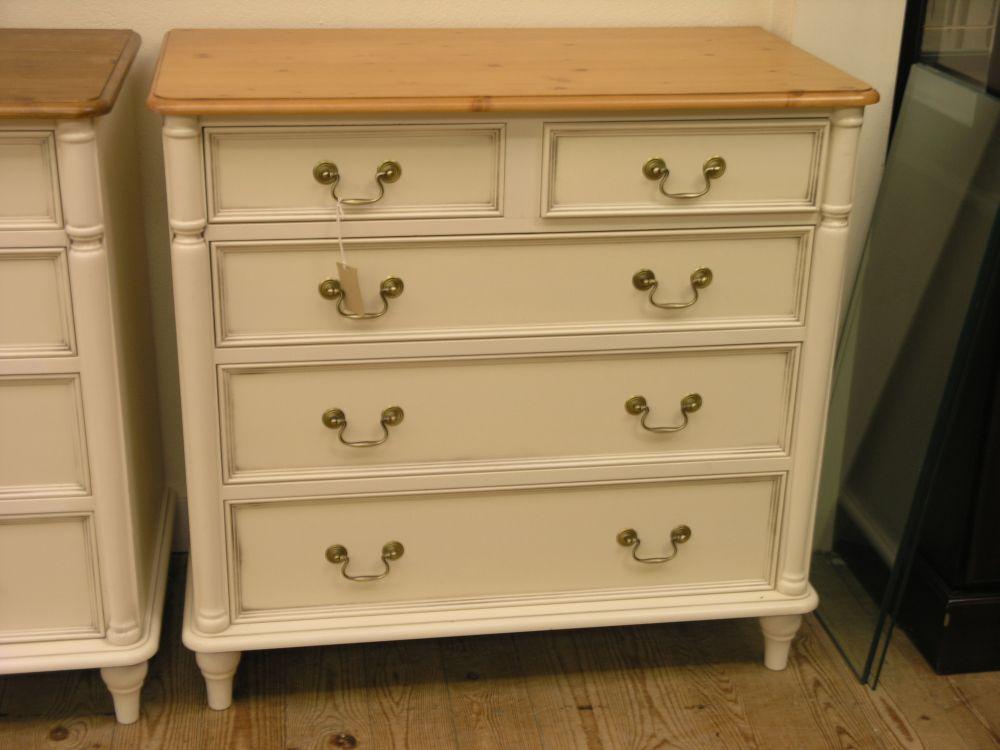 Appraisal: A Laura Ashley cream painted bedroom chest with waxed pine