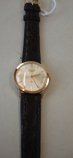 Appraisal: A gentleman's ct gold circular cased Longines wristwatch the signed