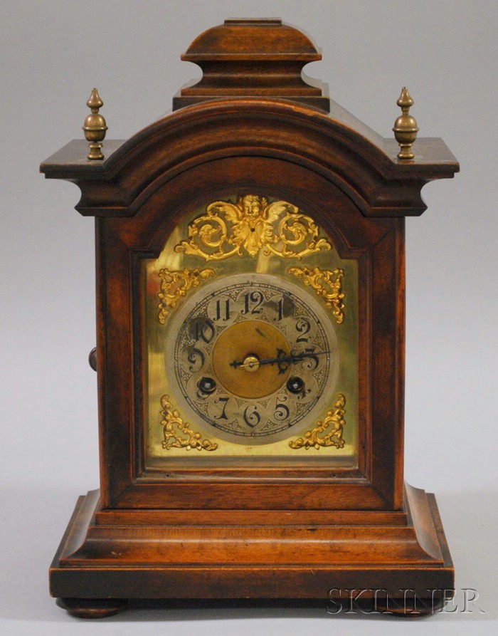 Appraisal: German Walnut-cased Table Clock with arched brass Arabic numeral dial