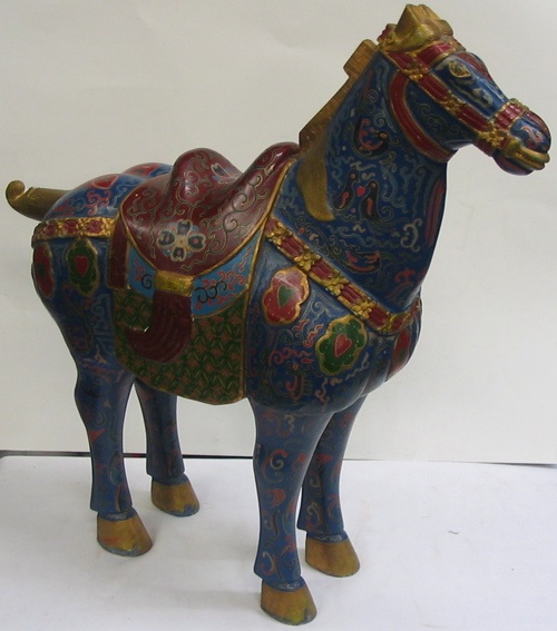 Appraisal: A CHINESE HAND CARVED WOODEN HORSE in the Tang style