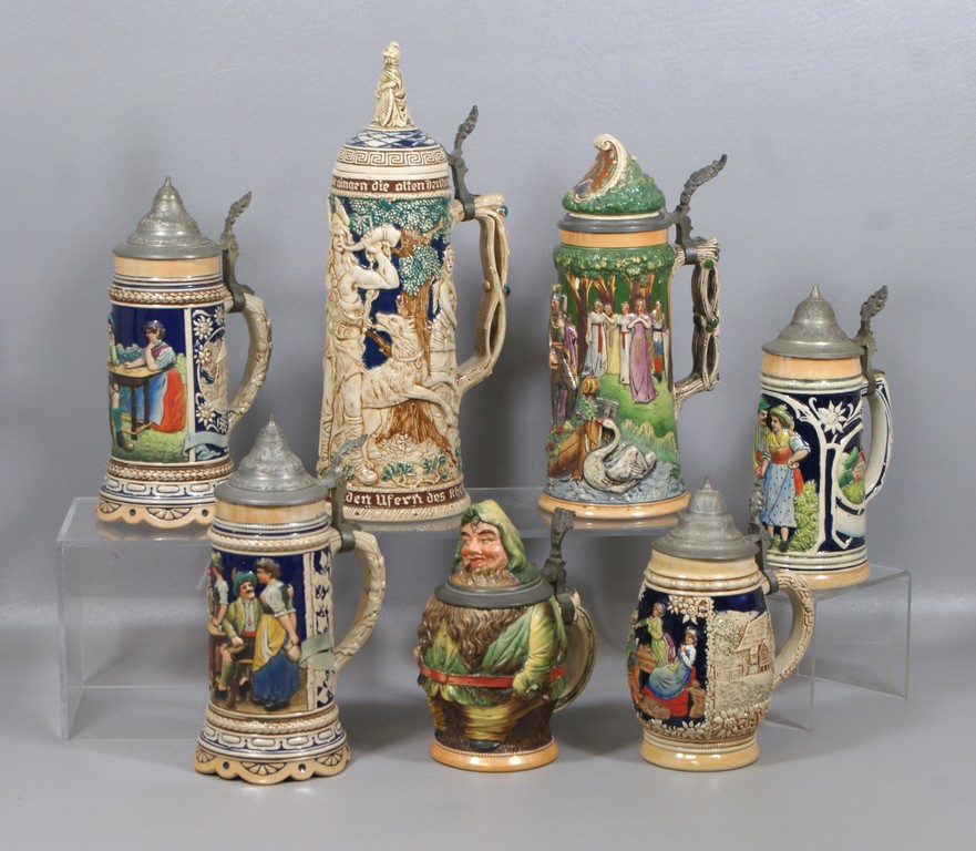 Appraisal: German steins one figural musical tallest gnome has multiple chips