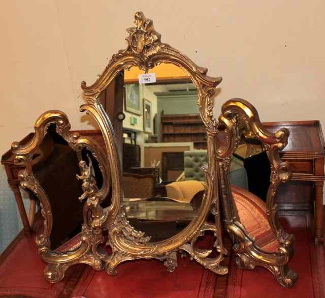 Appraisal: A GILT FRAMED THREE GLASS DRESSING TABLE MIRROR with scroll