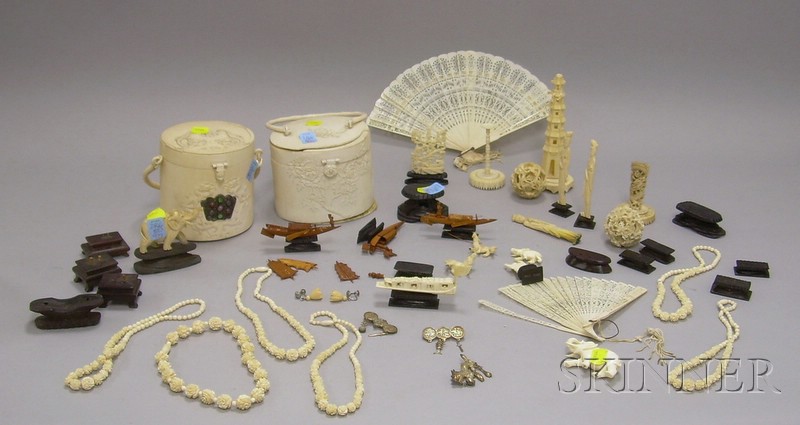 Appraisal: Lot of Assorted Ivory Carvings including purses mystery ball fans