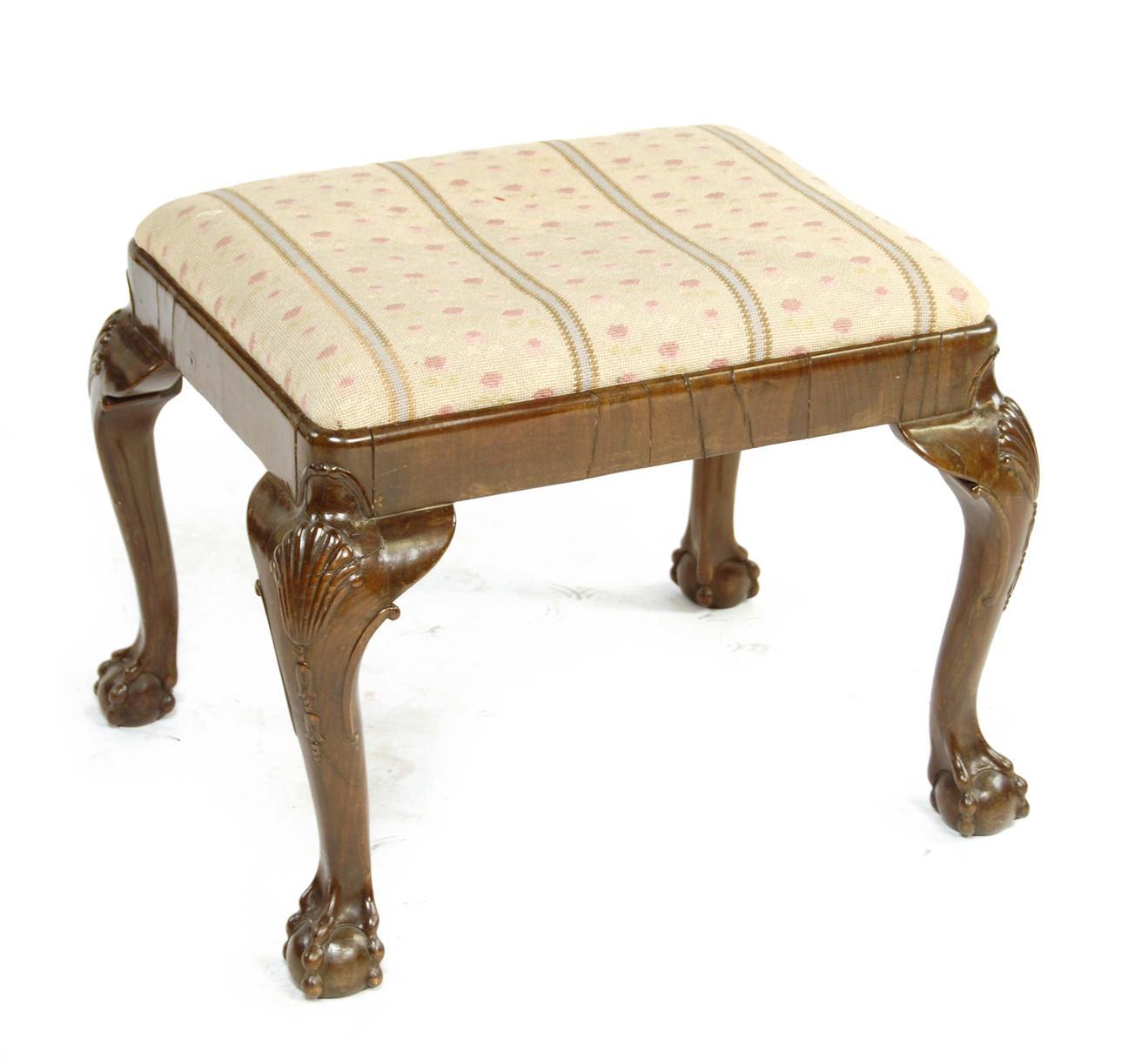 Appraisal: A walnut stool in George II style