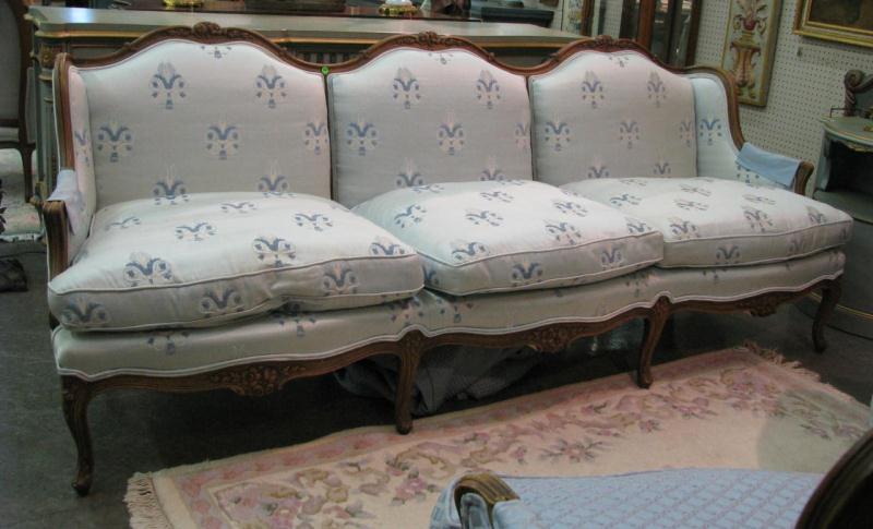 Appraisal: Vintage French Style Decorator Sofa with carved frame three cushion