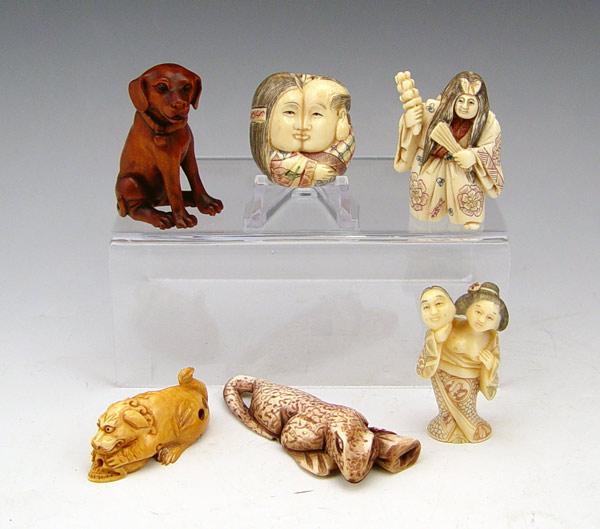 Appraisal: GROUP OF CARVED NETSUKE Including ivory and wood One erotica