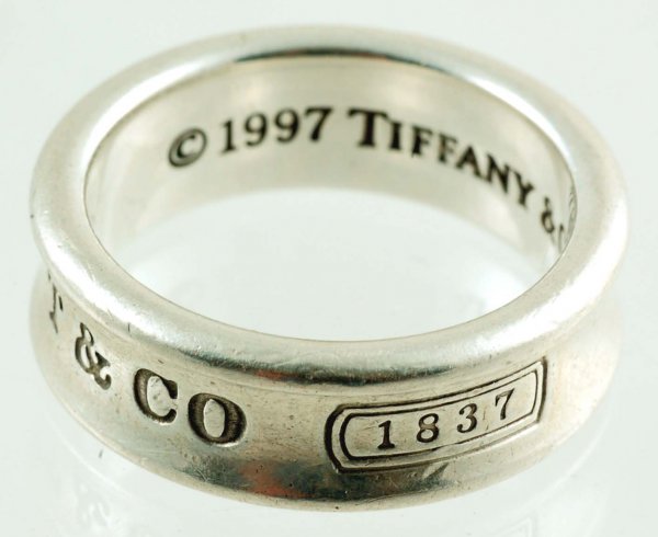 Appraisal: A Tiffany sterling silver ring Exterior marked T Co Interior