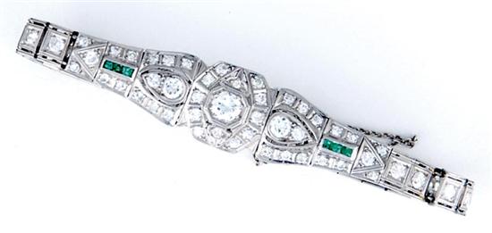 Appraisal: Platinum diamond and emerald bracelet circa graduated links set with