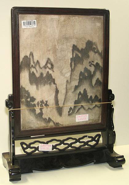 Appraisal: A marble plaque mounted as a table screen Decorated with