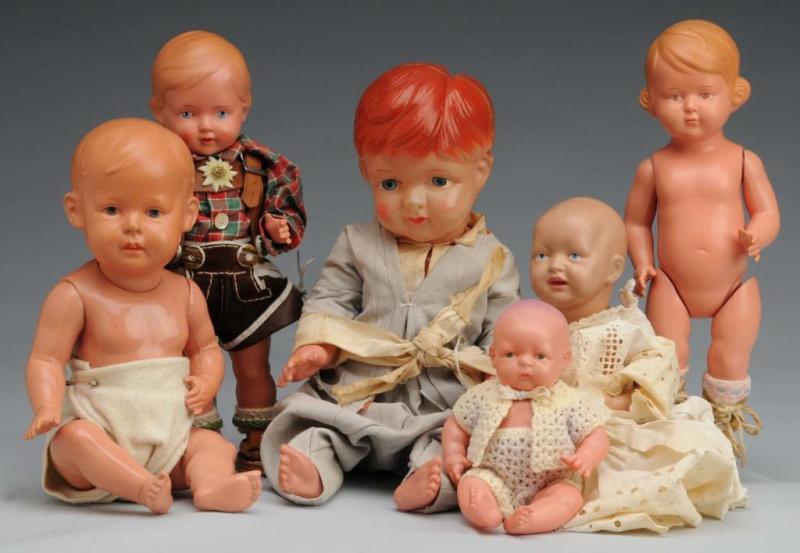 Appraisal: Lot of Celluloid Dolls Description Germany Japan Ca s German