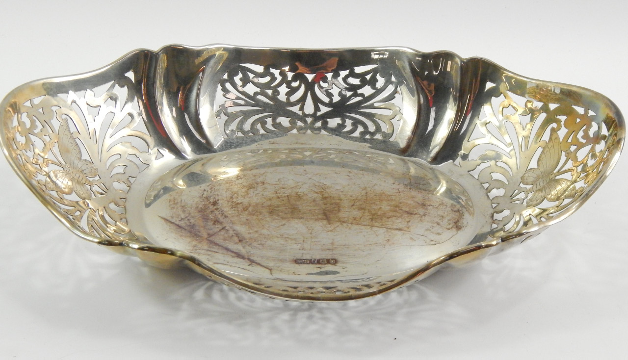 Appraisal: A George V Silver basket of serpentine oval form decorated