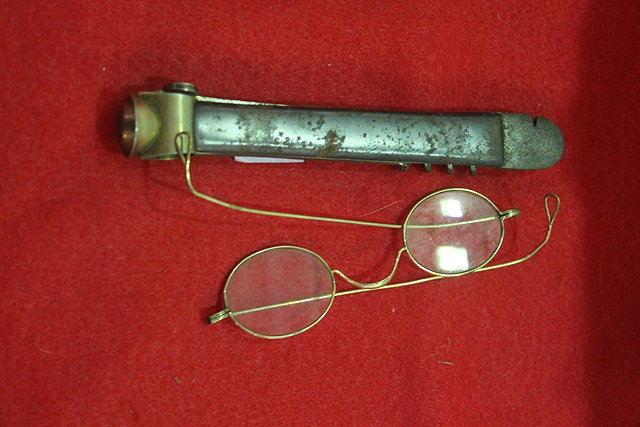 Appraisal: A TH CENTURY CIGAR CUTTER together with a pair of