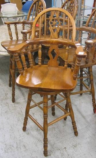 Appraisal: A SET OF FOUR OAK SWIVEL BARSTOOLS American modern Each