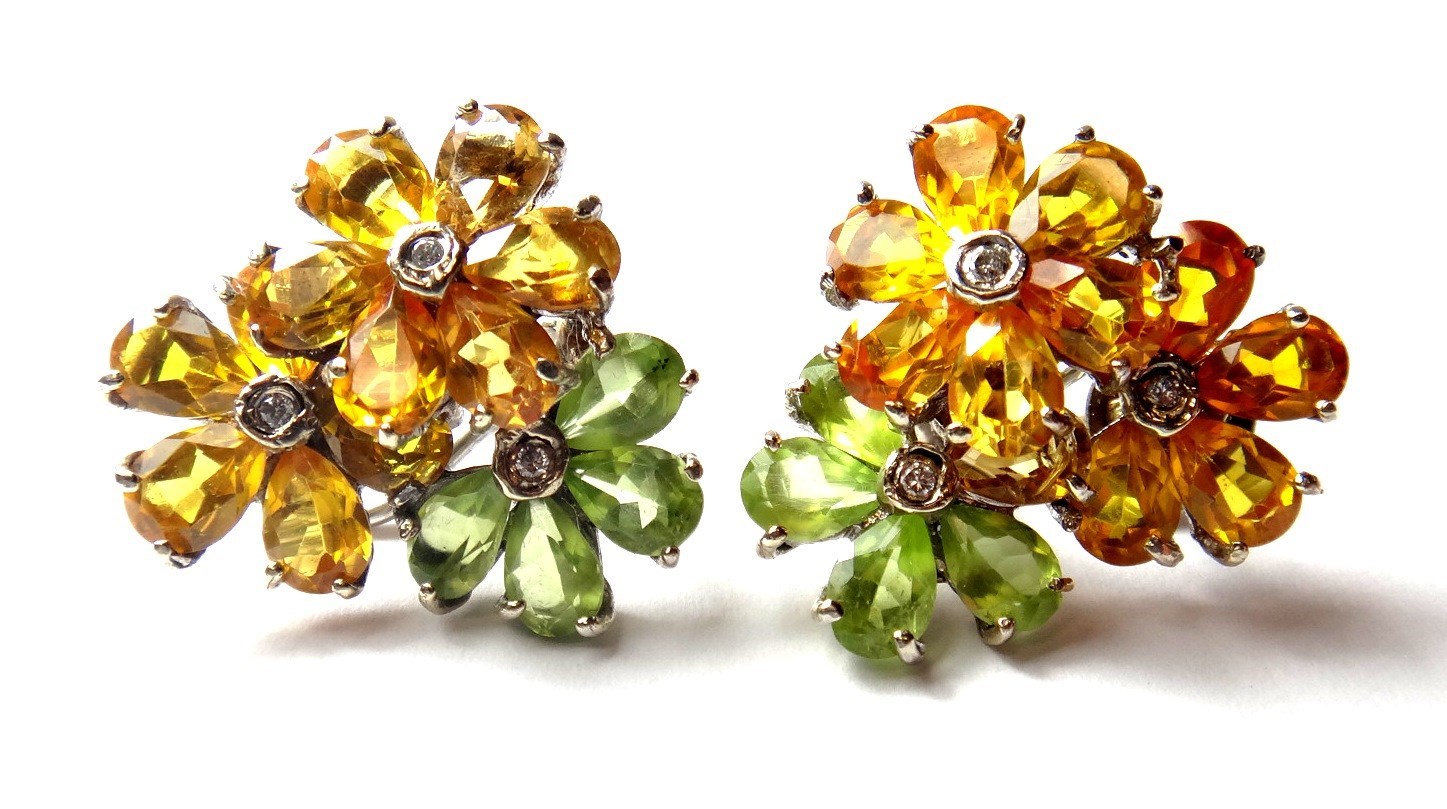 Appraisal: A pair of white gold citrine peridot and diamond set