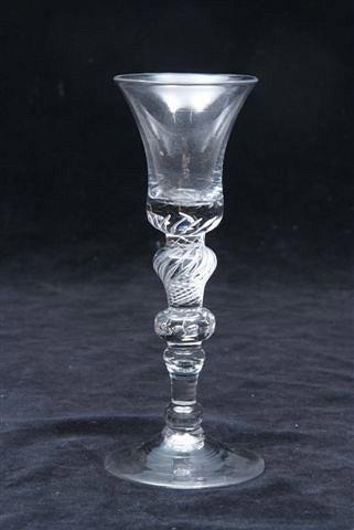 Appraisal: A COMPOSITE STEM WINE GLASS with a trumpet shaped bowl