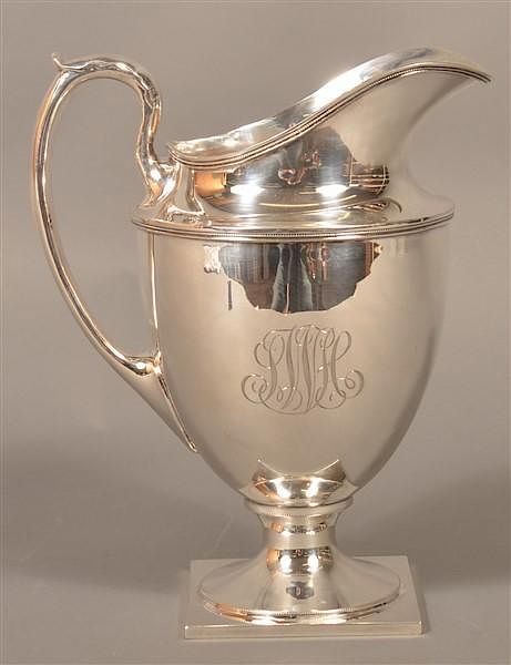 Appraisal: Sterling Silver Footed Water Pitcher Sterling Silver Footed Water Pitcher