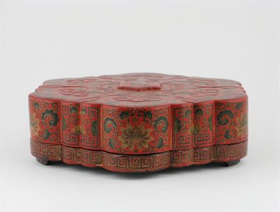 Appraisal: A Chinese red lacquer hexagonal box and cover containing seven