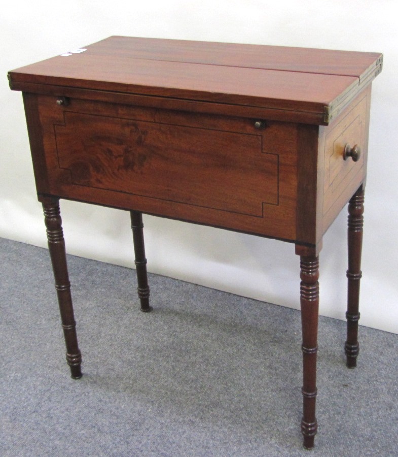 Appraisal: A George IV mahogany work table the fold out top