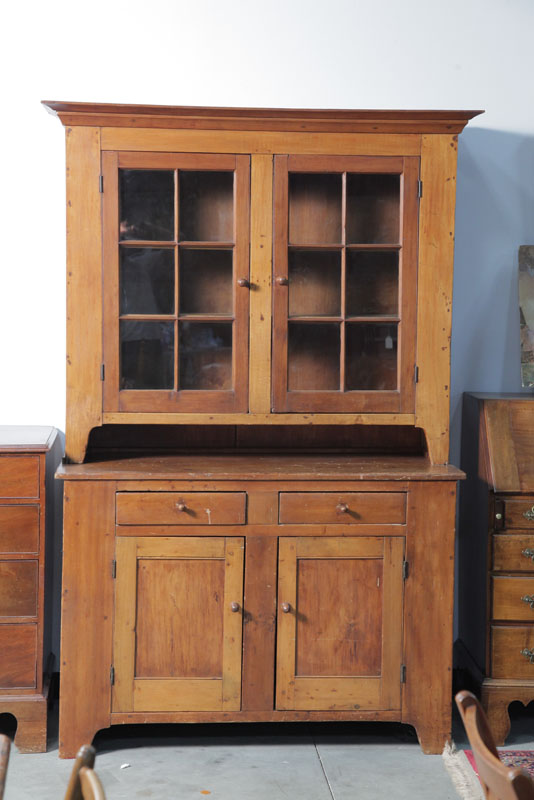 Appraisal: TWO PIECE STEPBACK CUPBOARD A marriage having a pine base