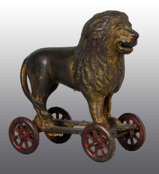 Appraisal: Cast Iron Lion on Wheels Still Bank Condition Excellent Size