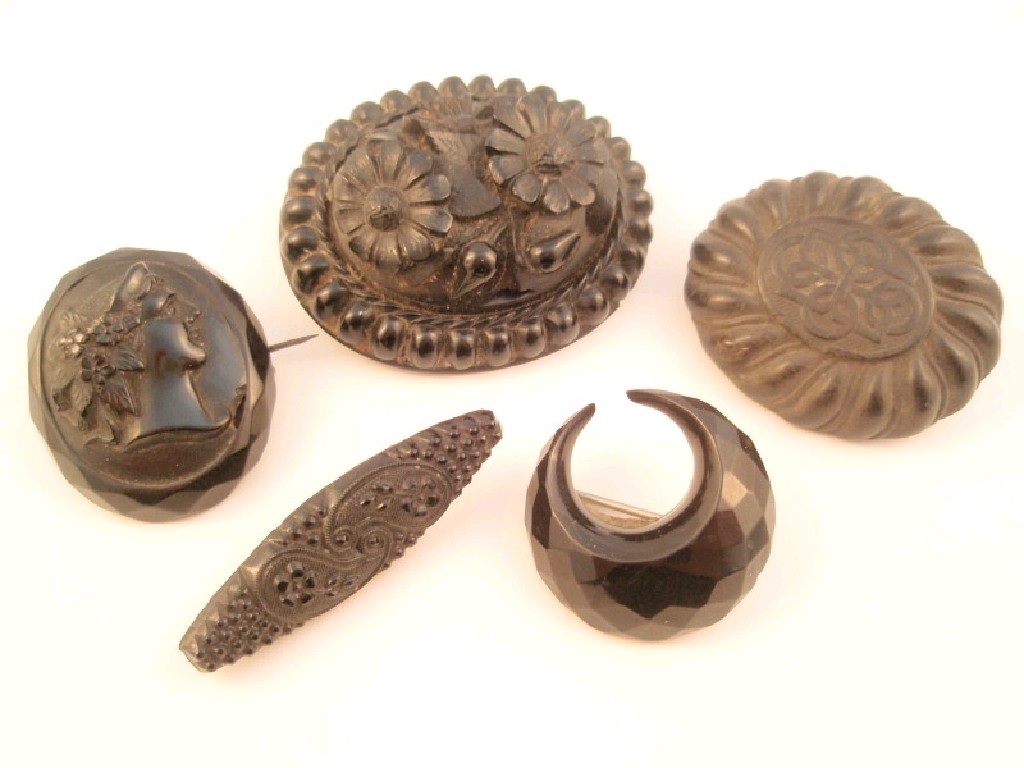 Appraisal: Victorian jet bangle and five jet and other brooches