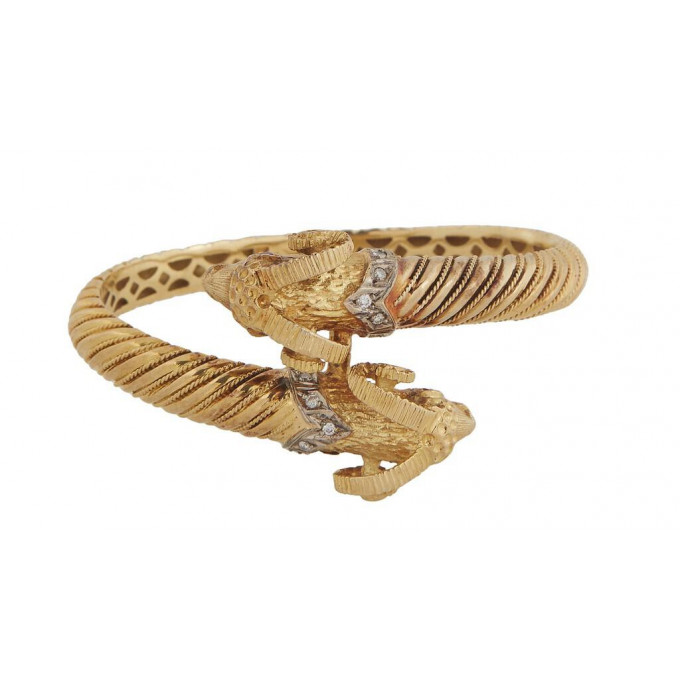 Appraisal: K Yellow Gold Ram Head Hinged Bypass Bangle Bracelet the