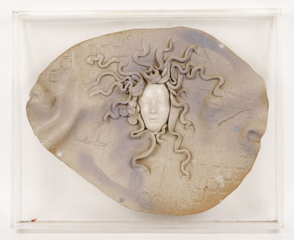 Appraisal: Ceramic mythological Medusa head sculpture Free form ceramic background with