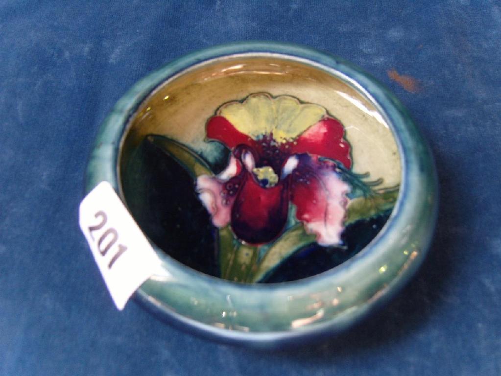 Appraisal: A small Moorcroft dish of circular form with curved rim