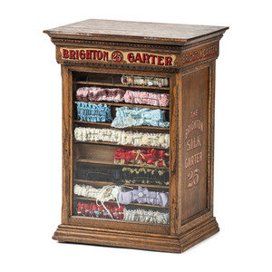 Appraisal: A Brighton Silk Garter Advertising Store Display Case Early th