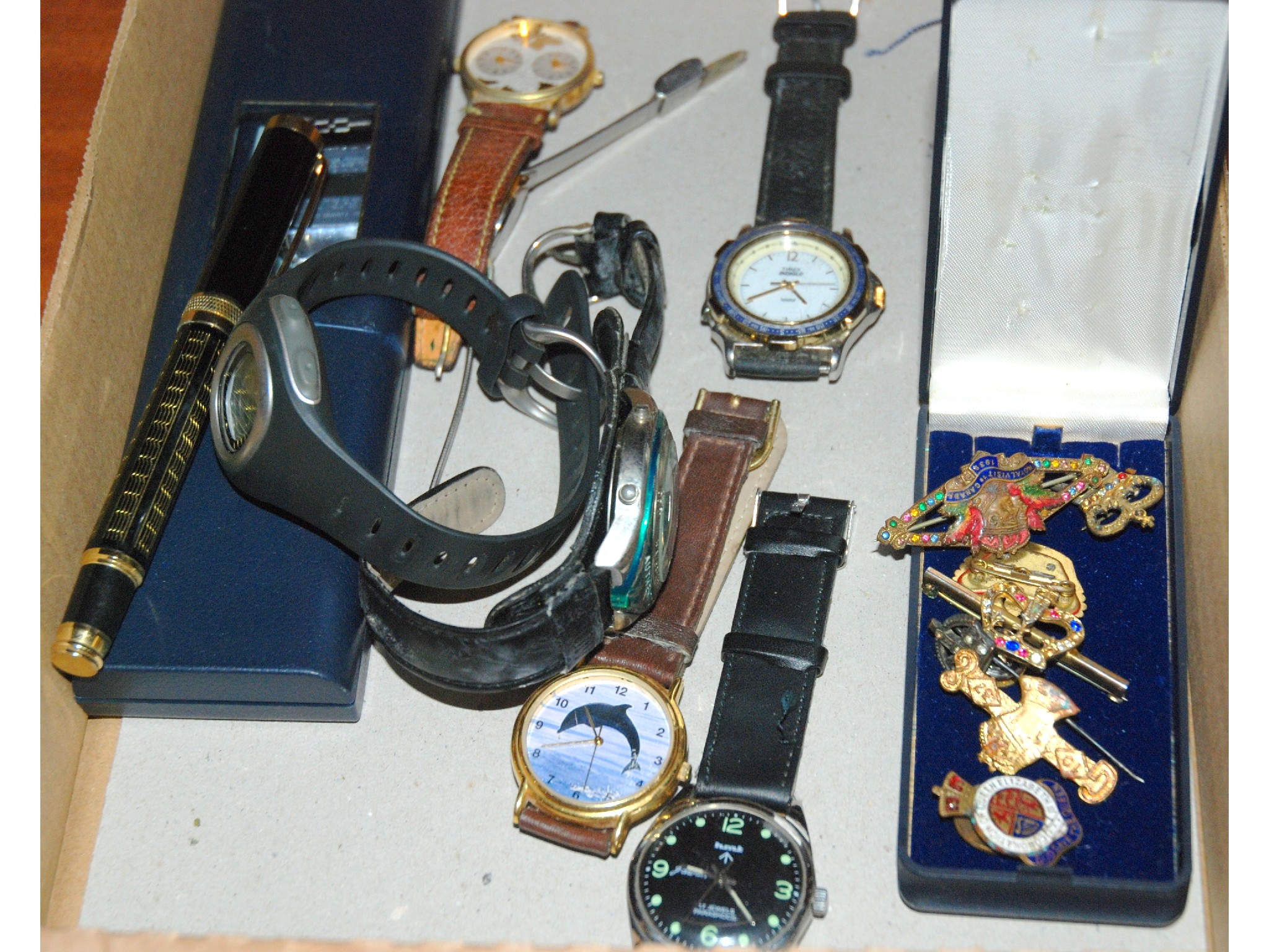 Appraisal: Seven various wristwatches fountain pen lapel badges etc