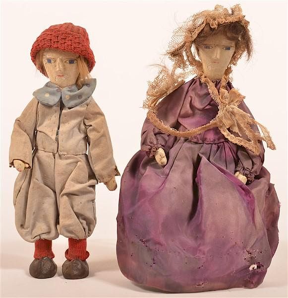 Appraisal: Two Wood and Composition Folk Art Dolls Two Wood and