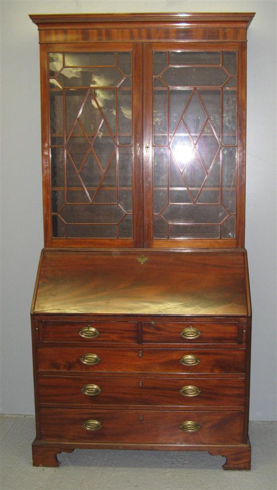 Appraisal: th Century mahogany bureau bookcase the interior with cupboards pigeon