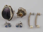 Appraisal: A mixed lot comprising two white metal tests silver rings