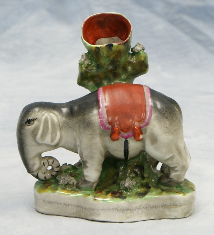 Appraisal: Staffordshire figural spill vase Gray Elephant hairline in body tall