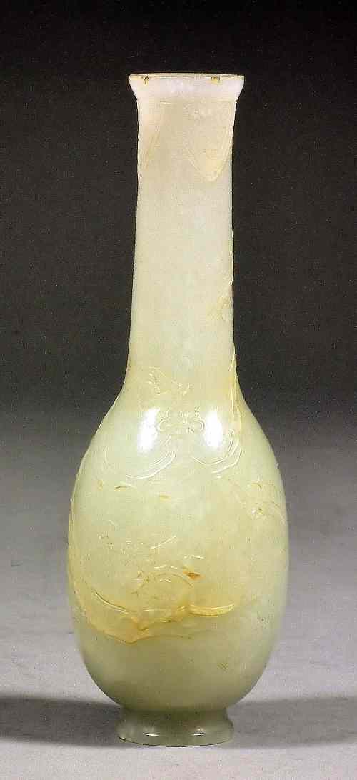 Appraisal: A Chinese white jade small bottle shaped vase the exterior