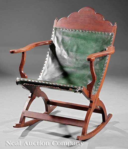 Appraisal: A Fine American Carved Cherrywood Campeche Rocking Chair early th