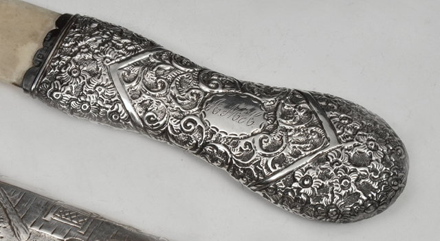 Appraisal: A VICTORIAN SILVER HANDLED PAGE TURNER with ivory blade the