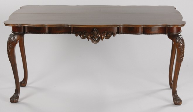 Appraisal: Figural walnut table slide top with shaped front shell carved