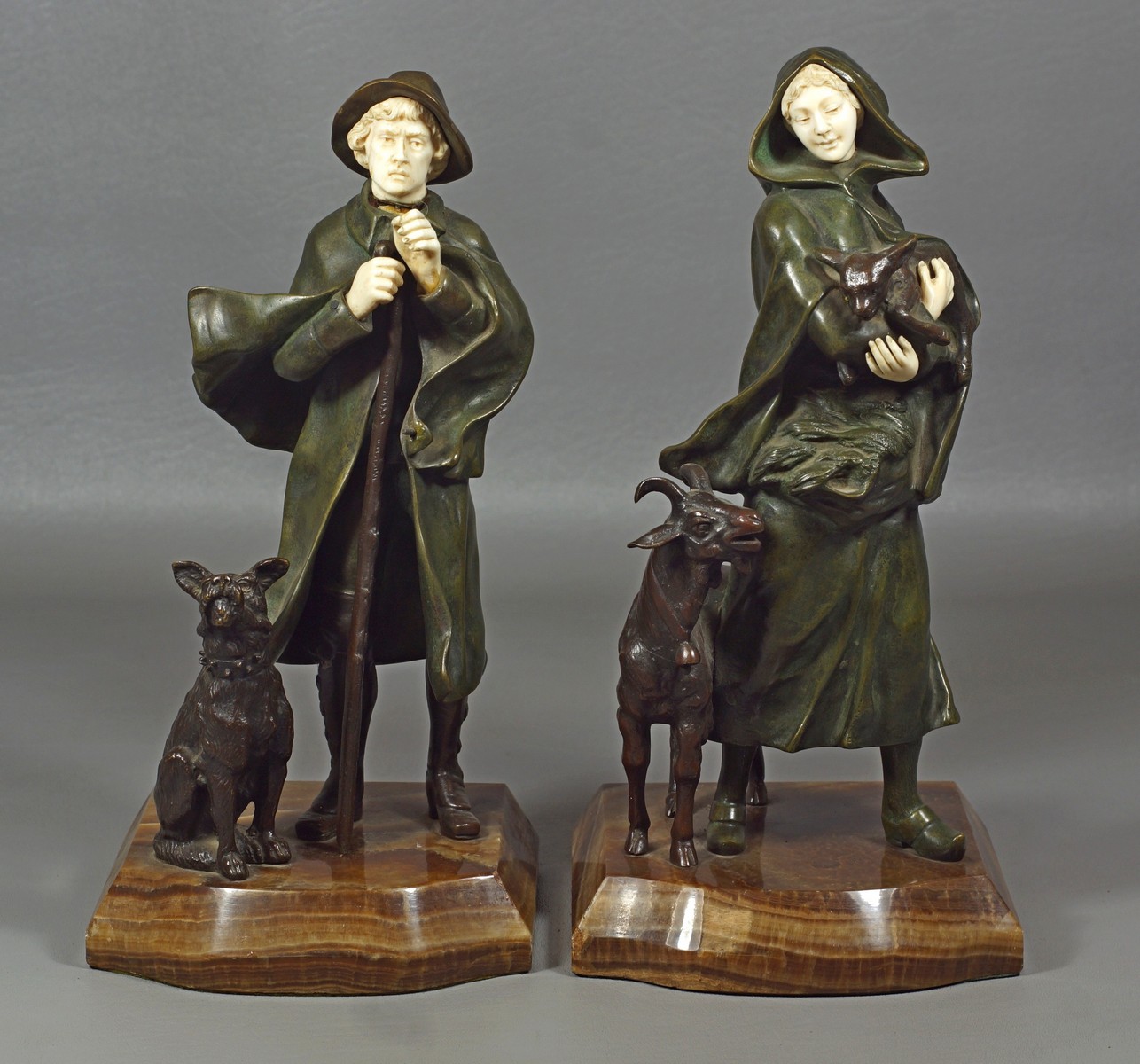 Appraisal: Georges Omerth French - Pair of Bronze Figures with ivory