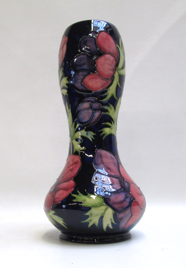 Appraisal: MOORCROFT POTTERY VASE having a cobalt ground in the Anemone