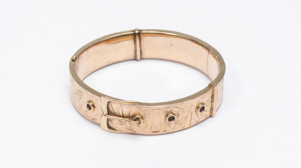 Appraisal: LATE VICTORIAN GOLD BUCKLE BANGLE BRACELET K yellow gold engraved