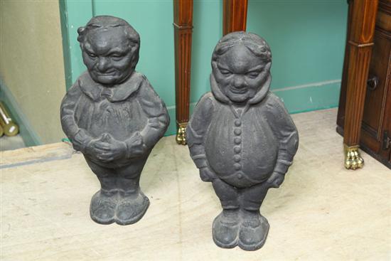 Appraisal: PAIR OF FIGURAL ANDIRONS Depicting two robust gentlemen one with