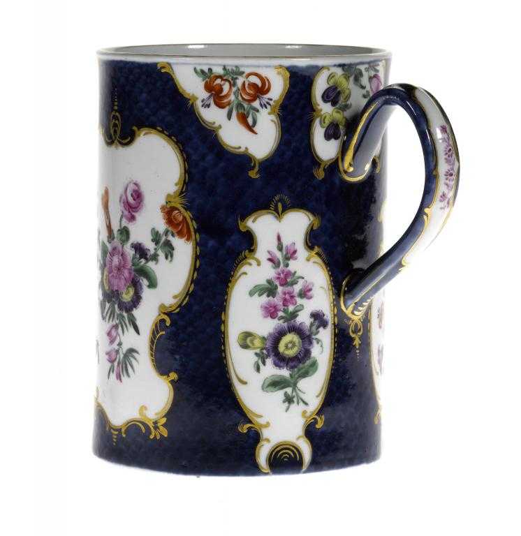 Appraisal: A WORCESTER SCALE BLUE GROUND MUG of cylindrical shape enamelled