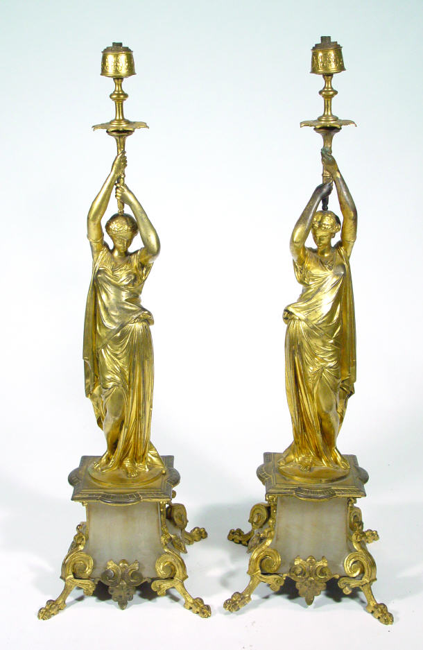 Appraisal: Pair of gilt Ormolu figural lamp bases the sconces supported