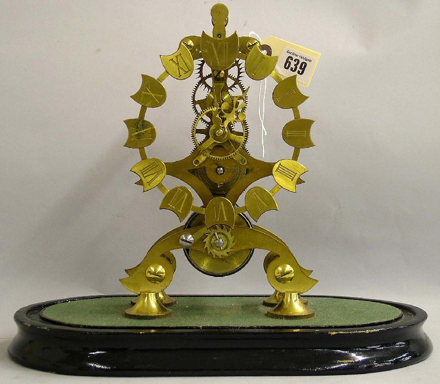 Appraisal: Single fusee brass skeleton clock the chapter ring with Roman