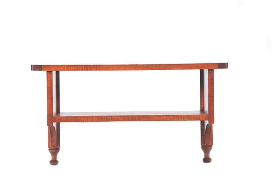 Appraisal: HANGING SHELF American th century curly maple Unsigned example by